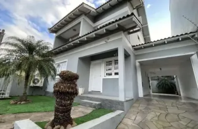 Sobrado com 3 dormitorios, 1 suite, sotão, 3 vagas de garagem - moinhos de ventos, canoas/rs