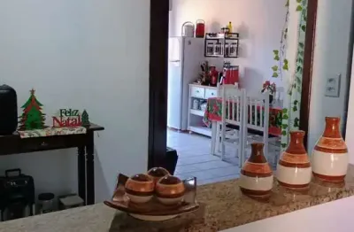 Casa à venda em Canoas, Bairro Harmonia, com churrasqueira e lareira