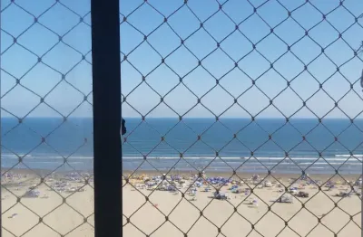 Oportunidade única ! apto abaixo do preço.  são 2 dorms , sacada vista mar pé na areia na guilhermina.