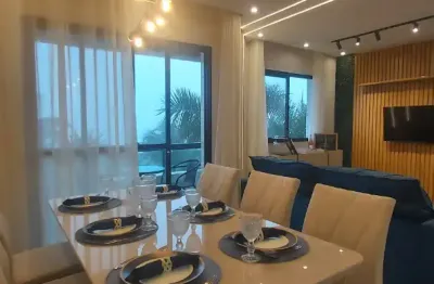 Deslumbrante apartamento 100% frente mar . imóvel impecável