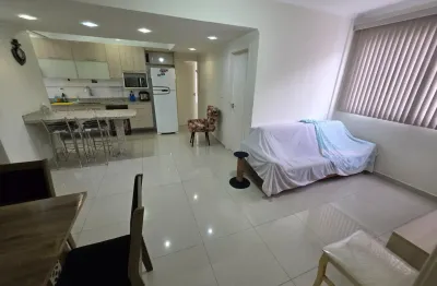 Canto do forte: 2 dorms/ 2 vagas/ 2 banheiros/ prédio frente mar