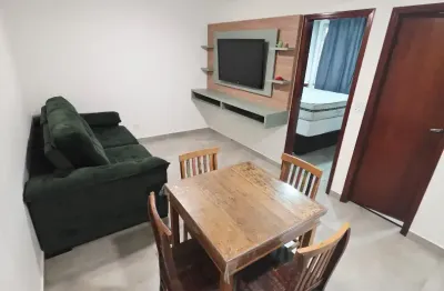 Apartamento impecável em prédio com elevador e garagem excelente localização