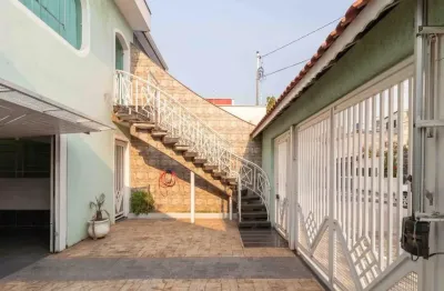 Linda casa assobradada no parque sevilha com 3 suítes e garagem para até 10 carros