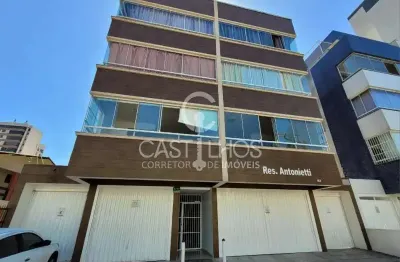 Aconchegante apartamento no centro de tramandaí com dormitório e box