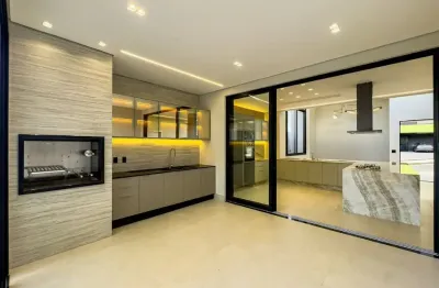 Viva o máximo do luxo, conforto e exclusividade nesta deslumbrante casa térrea