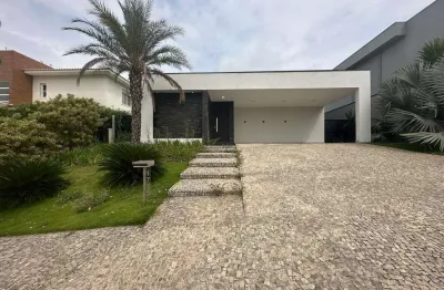 Imponente casa térrea com arquitetura moderna na região do alphaville, campinas-sp