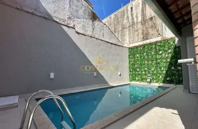 Casa geminada na mirim em praia grande – com piscina, churrasqueira e 3 vagas