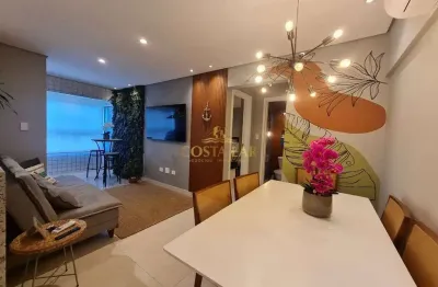 Apartamento mobiliado e planejado: 1 suíte, 54m² e varanda - forte, praia grande