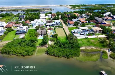 Lindo lote duplo com fundos para a baia da praia do capri, são francisco do sul