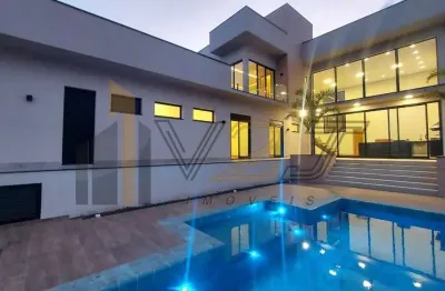 Linda e moderna casa térrea com mezanino à venda no condomínio campo de toscana em vinhedo - sp.