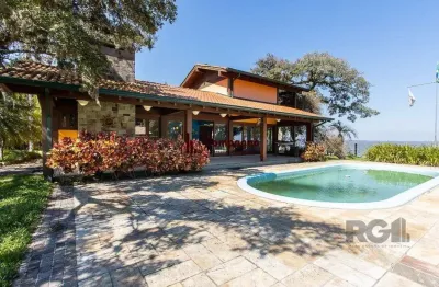 Terreno de 5.200m², rodeado pela natureza, possuindo 482m² de área construída