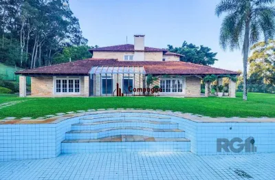 Casa em condomínio fechado com 5 quartos à venda na Estrada das Três Meninas, 1402, Vila Nova, Porto Alegre