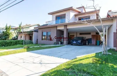 Casa em condomínio 4 dormitórios à venda belém novo porto alegre/rs