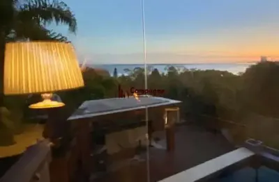 Casa com 4 quartos à venda na Rua Bororó, 157, Vila Assunção, Porto Alegre