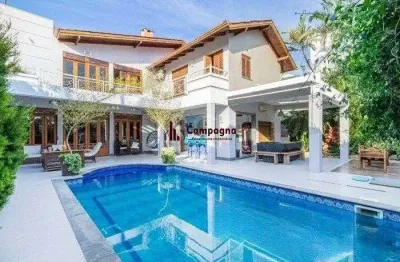 Excelente casa de  386m² com 04 dormitórios sendo 03 suítes.