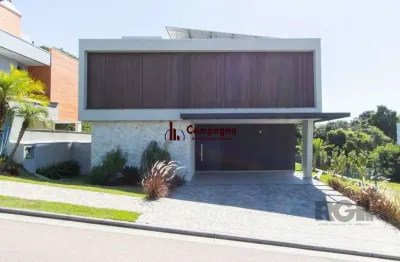 Casa em condomínio 4 dormitórios à venda vila nova porto alegre/rs
