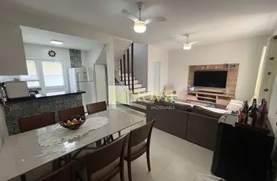 Sobrado em condomínio à venda, com duas suítes e duas vagasde garagem, na praia do massaguaçu, em c