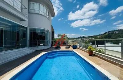 Luxuosa casa em Tamboré: 4 quartos, 4 suítes, 3 salas, 6 banheiros, 3 vagas de garagem, 475m² - Venda ou Locação em Santana de Parnaíba-SP.