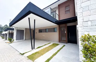 Casa moderna de 310m² à venda no residencial singular tamboré