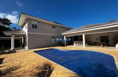 Casa de condomínio fechado - 4 dormitórios, 398 m², espaço gourmet amplo c/ pisicna!!