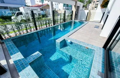 Lindo apartamento mobiliado com 2 quartos na praia de palmas, prédio com piscina e salão de festas