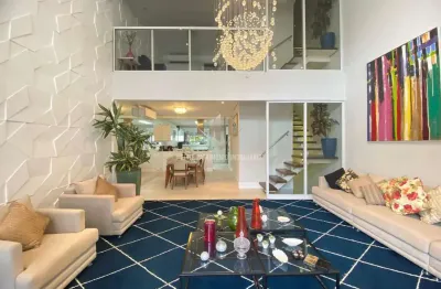 Casa em condomínio fechado pé na areia na praia de pernambuco guarujá sp.