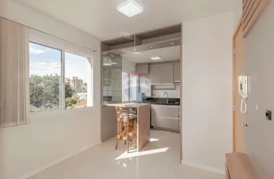 Apartamento à venda no bairro menino deus com 1 dormitório, vaga e elevador: compacto e elegante!