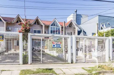 Casa com 2 quartos à venda na Rua Heitor Kramer, 324, Guarujá, Porto Alegre