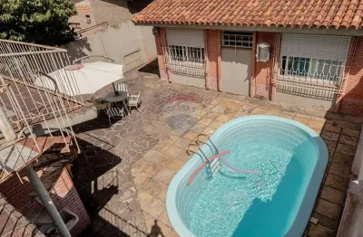Casa com 4 quartos à venda na Rua Doutor Barcelos, 1970, Camaquã, Porto Alegre