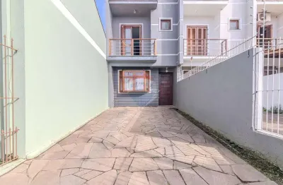 Casa com 3 quartos à venda na Rua Hugo Nelson Magalhães, 141, Rubem Berta, Porto Alegre