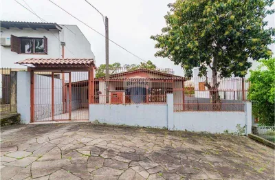 Casa com 3 quartos à venda na Rua Cunha Neto, 334, Nonoai, Porto Alegre