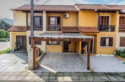 Casa em condomínio fechado com 2 quartos à venda na Avenida Edgar Pires de Castro, 1286, Hípica, Porto Alegre