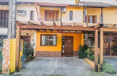 Casa em condomínio fechado com 2 quartos à venda na Avenida Edgar Pires de Castro, 1286, Hípica, Porto Alegre