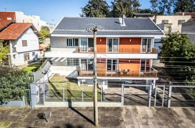 Casa com 4 quartos à venda na Rua Paulo Madureira Coelho, 480, Alto Petrópolis, Porto Alegre