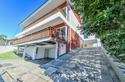 Casa com 4 quartos à venda na Rua Paulo Madureira Coelho, 480, Alto Petrópolis, Porto Alegre