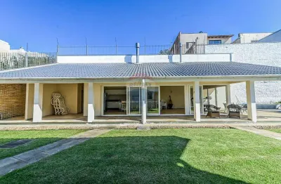 Casa com 4 quartos à venda na Rua Paulo Madureira Coelho, 480, Alto Petrópolis, Porto Alegre