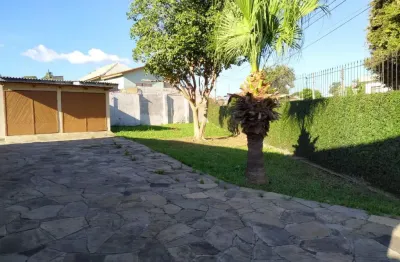 Casa com 3 quartos à venda na Rua Amália Figueiroa, Partenon, Porto Alegre