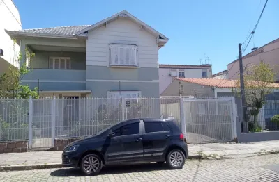 Casa cinco dormitórios ( sendo 4 suítes) bairro santo antônio