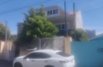 Casa com 3 quartos para alugar na Rua José Arcione Roberto Batista, 187, Uberaba, Curitiba