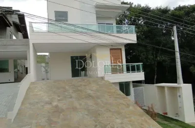 Sobrado moderno com 3 suítes sendo a master com hidro no condomínio aruã em mogi das cruzesaruã