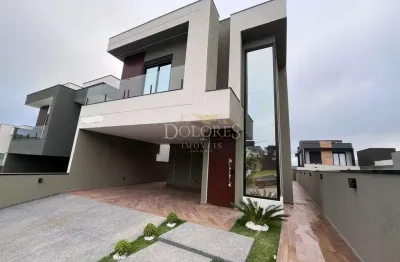 Belo sobrado com 3 suítes com closet e climatizadas no condomínio aruã brisas em mogi das cruzes sp.