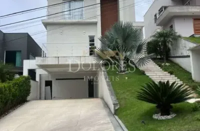 Bela casa alto padrão na zona leste com linda vista no condomínio aruã lagos em mogi da cruzes.