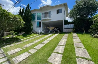Excelente sobrado em 2 terrenos ( 600 m²) com 4 suítes no condomínio aruã em mogi das cruzes