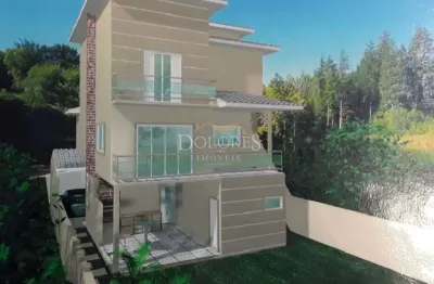 Terreno em declive com projeto aprovado no aruã brisas