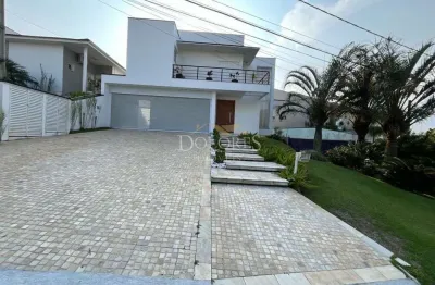 Maravilhoso sobrado com 4 suítes e fundo reserva no aruã ecopark lagos em mogi das cruzes.