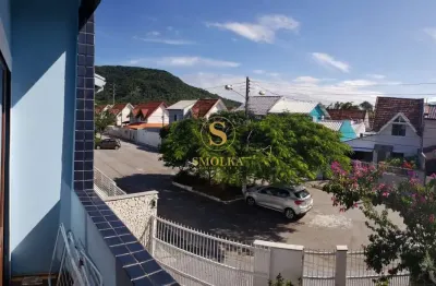 Casa em condomínio fechado com 4 quartos à venda na rua ilha dos corais, vargem do bom jesus, florianópolis, 150 m2 por r$ 1.200.000