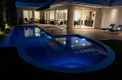 Casa em condomínio fechado com 4 quartos à venda na avenida dos dourados, jurerê internacional, florianópolis, 500 m2 por r$ 8.200.000