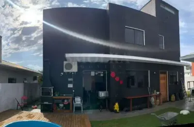 Casa em condomínio fechado com 3 quartos à venda na Rodovia Virgílio Várzea, Canasvieiras, Florianópolis, 390 m2 por R$ 2.100.000