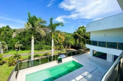 Casa em condomínio fechado com 5 quartos à venda na rua das caraúnas, jurerê internacional, florianópolis, 800 m2 por r$ 12.000.000