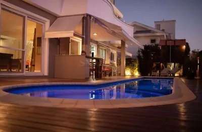 Casa em condomínio fechado com 4 quartos à venda na rua dos robaletes, jurerê internacional, florianópolis, 436 m2 por r$ 5.500.000